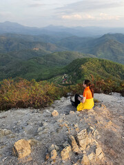 Fototapeta premium Tourist is enjoying on beautiful scenery of mountains. Taken at Betong district, Yala province in Thailand.