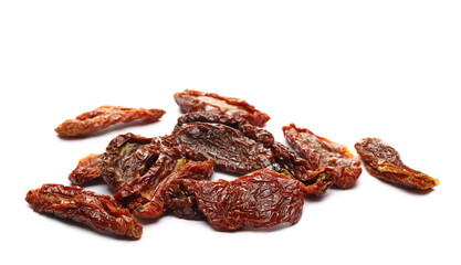 Sun dried tomatoes pile isolated on white background