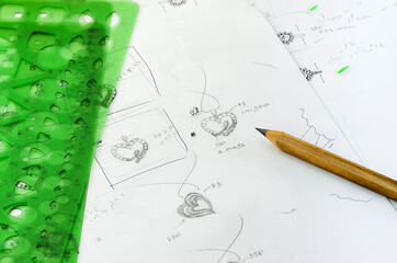 The sketch is designing jewelry pendant.