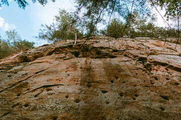 Hiking trail by the Licu and Langu sandstone cliffs by the Gauja river in Latvia