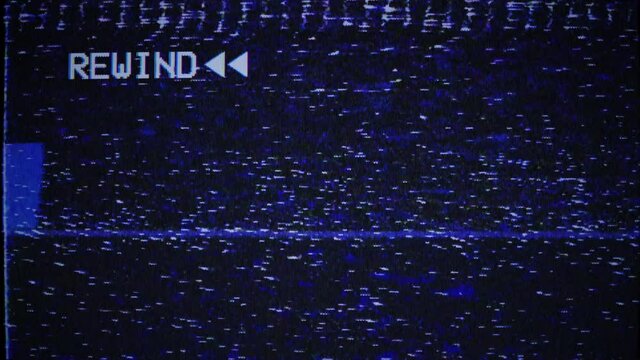 Rewind sign, arrows marks, VHS noise texture. Static noise, glitch effect. Videocassette recorder. Damaged cassette  type, bad signal. TV noise. Retro, vintage 90s style animation. Seamless loop 4K 