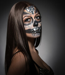Santa Muerte. Pretty young woman with face art