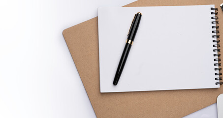 Flat lay, top view office table desk. Workspace with blank clip board, keyboard, office supplies,laptop,Calculator,copy space on white background.