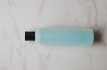 Plastic bottles on a light background with and without water