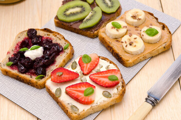 sweet vegetarian toasts with different fillings on the table