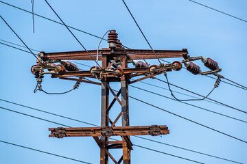 Electricity transmission line in the blue sky