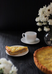 Food photo. Pear pie on black background. Beautiful food composition. Photo for recipe book.