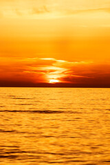 Beautiful Orange Sunset with Big Sun over the Sea Horizon, Nature Background