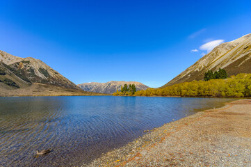 southern alpine alps mountain range at Lake Pearson Arthur's pass National Park New Zealand