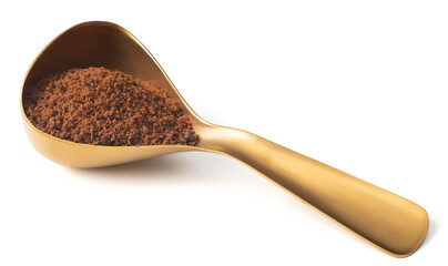 brown sugar in the measuring spoon, isolated on white background