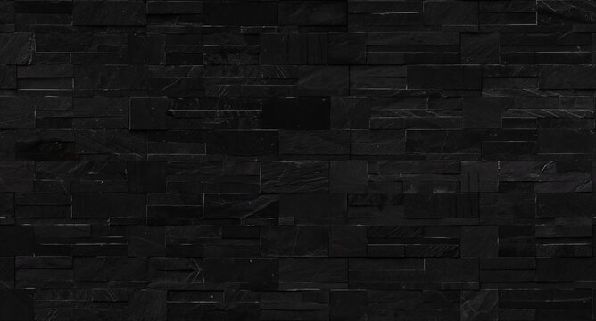 Seamless black brick wall texture for background.