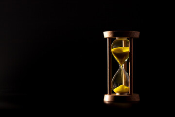 hourglass isolated on dark background