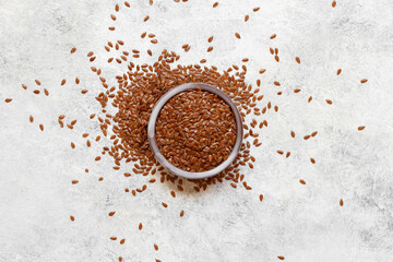 Raw Flax seeds in a ceramic bowl