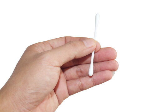 Hand holding Cotton buds isolated on white background.