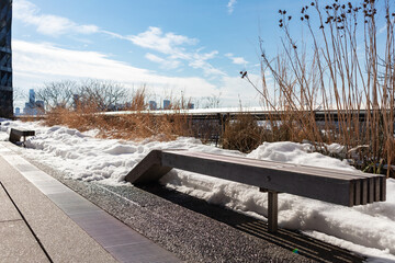 Empty Benches at The High Line with Snow during Winter in Chelsea of New York City