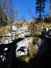 Natural karst rock formation little natural bridge in Rakov skocjan in Notranjska, Slovenia and...