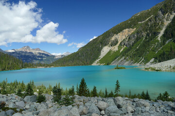 Fototapeta na wymiar Joffre Lake with beautiful water colour panoramic view landscape, in Canadian Rockies near Whistler, popular tourist hiking destination, British Columbia, Canada
