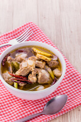 Spicy pork spare rib soup with herbs
