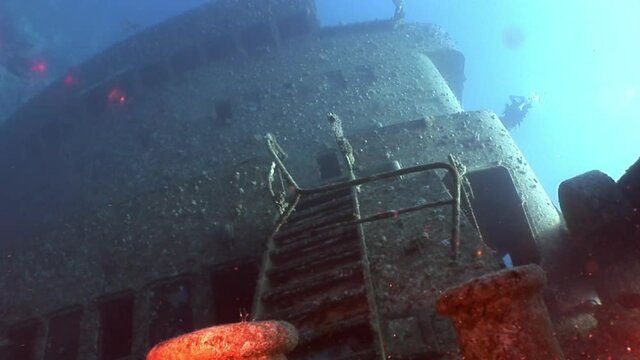 Stairs on Salem Express shipwrecks underwater in the Red Sea in Egypt. Extreme tourism on the ocean floor in the world of coral reefs, fish, sharks. Researchers of wildlife blue abyss. Deep diving.