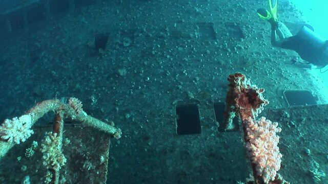 Stairs on Salem Express shipwrecks underwater in the Red Sea in Egypt. Extreme tourism on the ocean floor in the world of coral reefs, fish, sharks. Researchers of wildlife blue abyss. Deep diving.