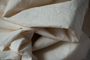 Obraz premium natural cotton fabric with multiple folds under soft, descriptive light 