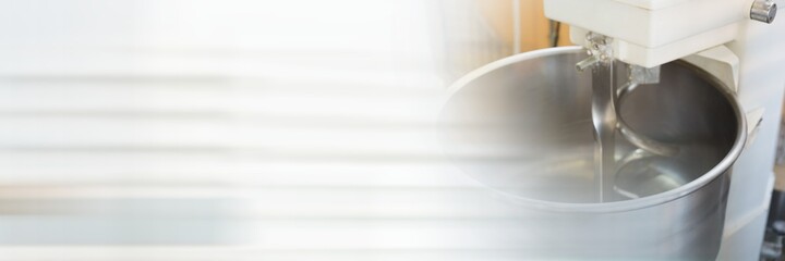 Stand mixer on a kitchen counter, restaurant kitchen and food industry concepts