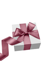 White gift box with pink bow and satin ribbon isolated on white background.	