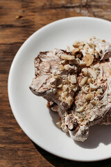 Airy protein chocolate cake with nuts.