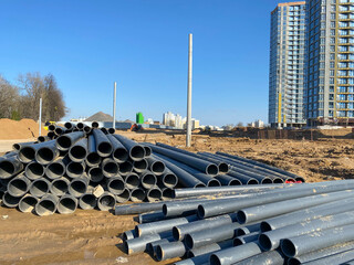 Warehouse of finished plastic pipes industrial outdoors storage site. Manufacture of plastic water...