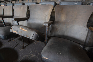 Abandoned chairs in a row