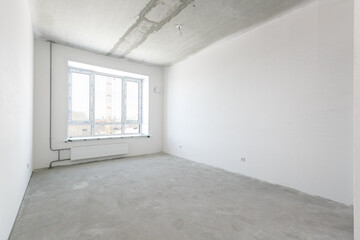 interior of the apartment without decoration in gray colors