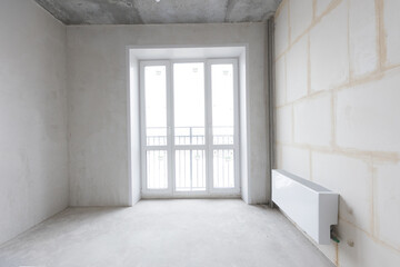 interior of the apartment without decoration in gray colors