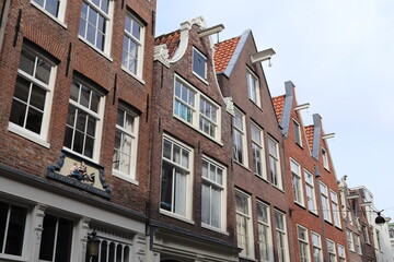 Fototapeta premium Amsterdam Jordaan Historic House Facades with Various Gables and Colored Gable Stone