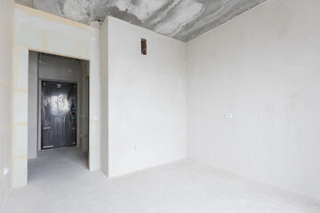 interior of the apartment without decoration in gray colors