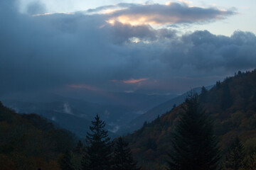 Sunrise over misty mountain