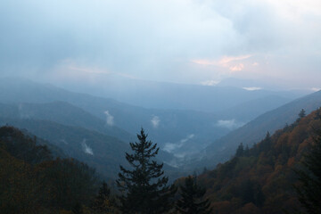 Sunrise over misty mountain