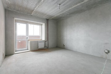 interior of the apartment without decoration in gray colors