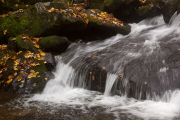 Stream cascading through rocks ourdoors