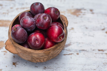 ripe plums on the table