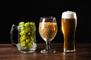 alcoholic drinks, beer with foam isolated on black background..