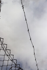 barbed wire fence fences barrier