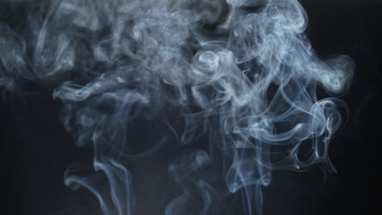 Movement color smoke girl black background with copy space.