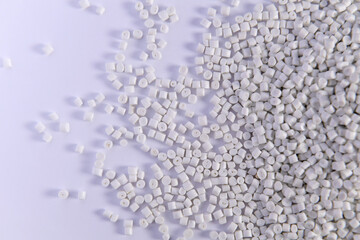 Polypropylene granule close-up background texture. plastic resin ( Masterbatch).Grey chemical granules for industrial plastic production