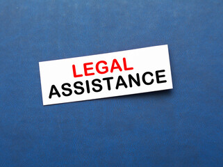 LEGAL ASSISTANCE. informationon on a sticker, on a blue background desktop .