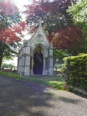Fototapeta premium View of the old cemetery and the decorative religious building