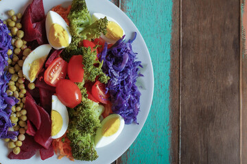 Food plate with healthy colorful salad