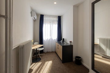 Interior of a hotel apartment, table, work area