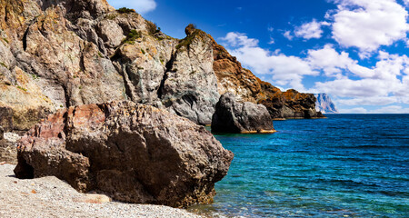 Fototapeta na wymiar Amazing landscape on coast of blue ocean in clear sunny weather