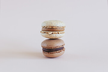 Tasty French macarons  on a pastel background.