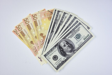 dollars and euros lined up one after another